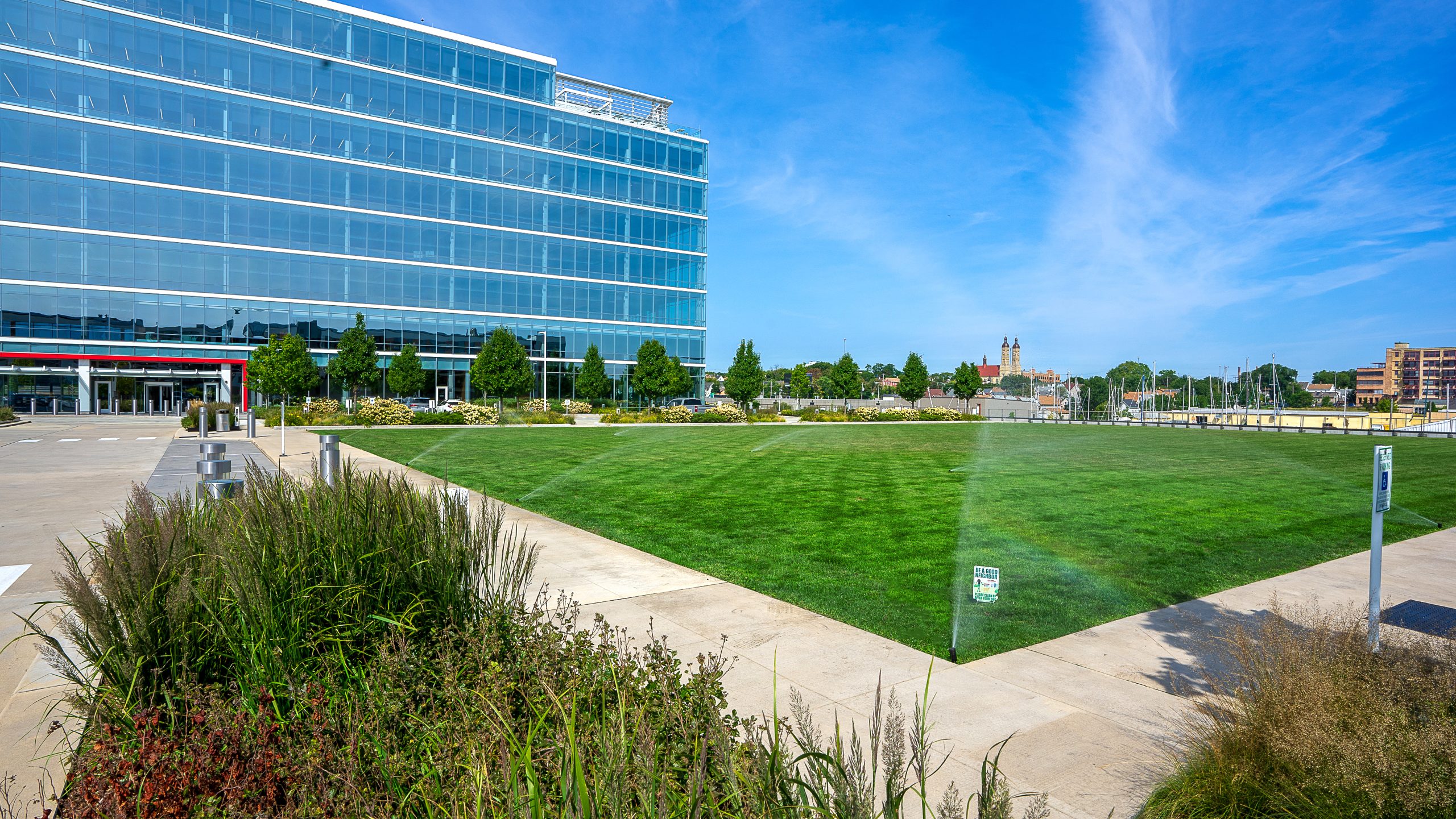 Irrigated turf maintained by landscape team at R1ver mixed-use campus